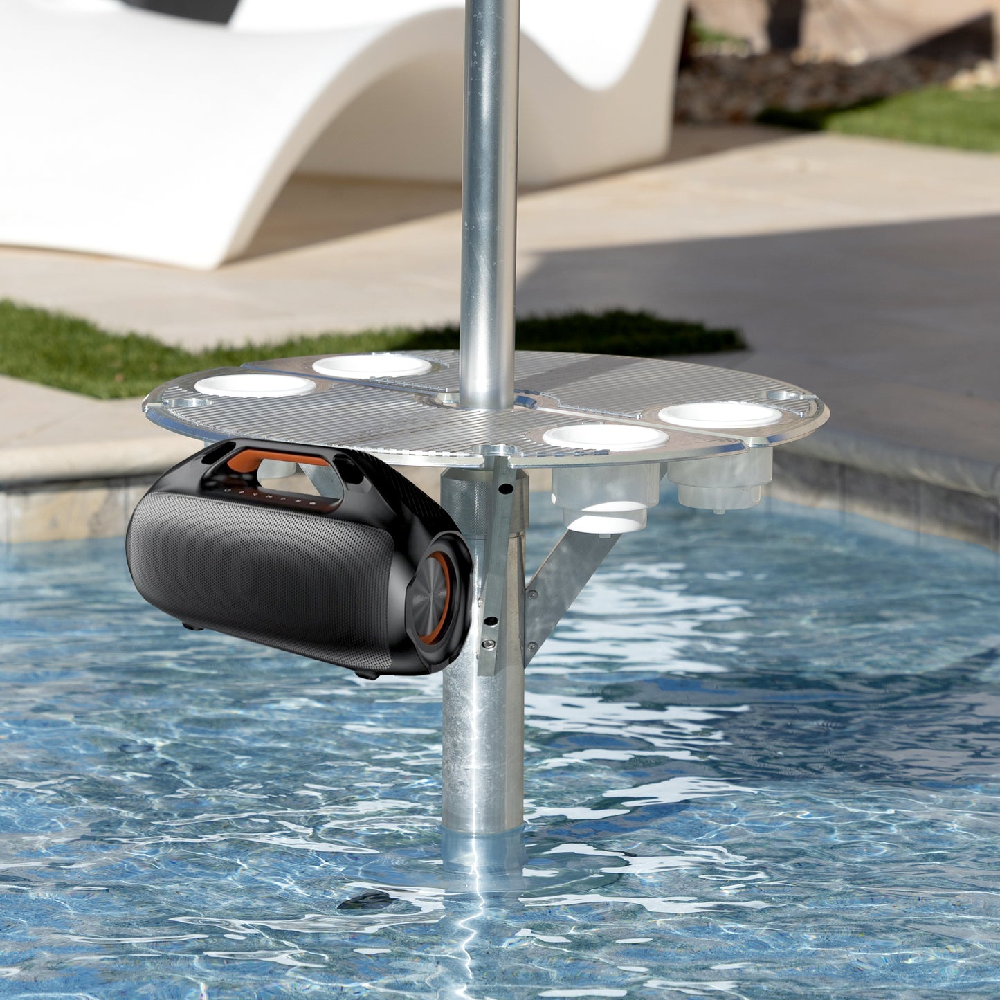 Bajamate Baja shelf PowerSound 160 Bluetooth speaker system mounted to Bajamate Poolside Lifestyle Table, delivering premium waterproof outdoor sound with deep bass and crystal-clear audio for backyard and poolside entertainment.