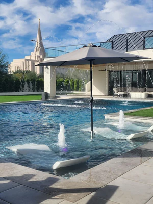 customer photo of bajamate baja shelf adapter kit installed in pool with umbrella mounted