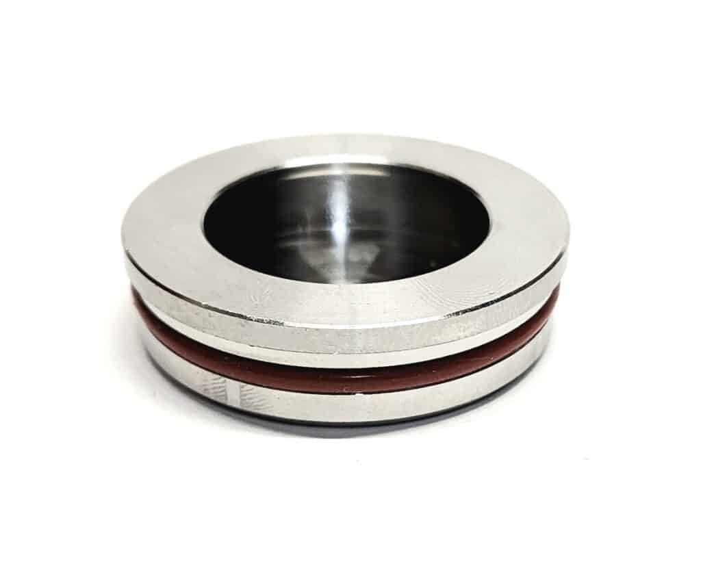 BajaMate 316 stainless steel pool cap on white background with waterproof seal and brushed marine finish, designed for in-pool sleeves.