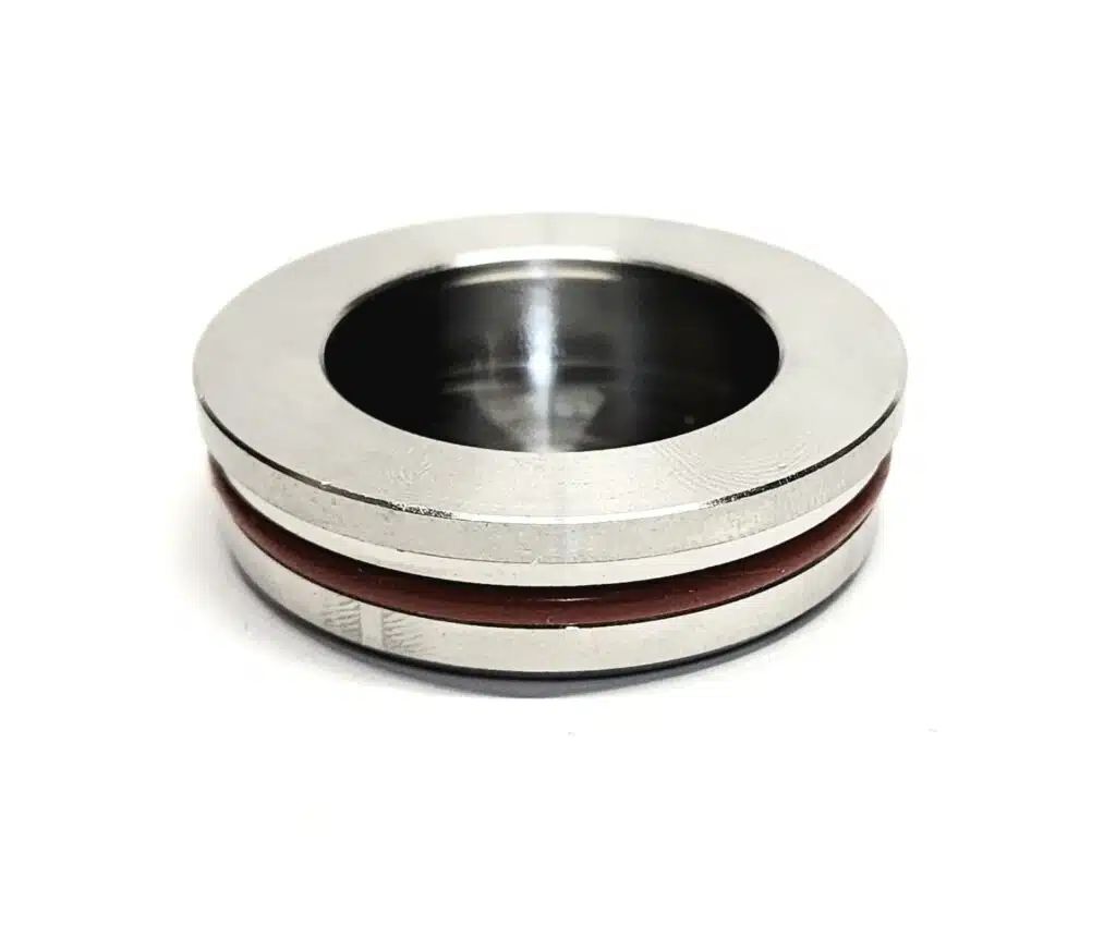 BajaMate 316 stainless steel pool cap on white background with waterproof seal and brushed marine finish, designed for in-pool sleeves.