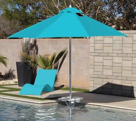 BAJAMATE in-pool umbrella in Caribbean Blue with matching table anchored on a Baja shelf for stable resort-style shade