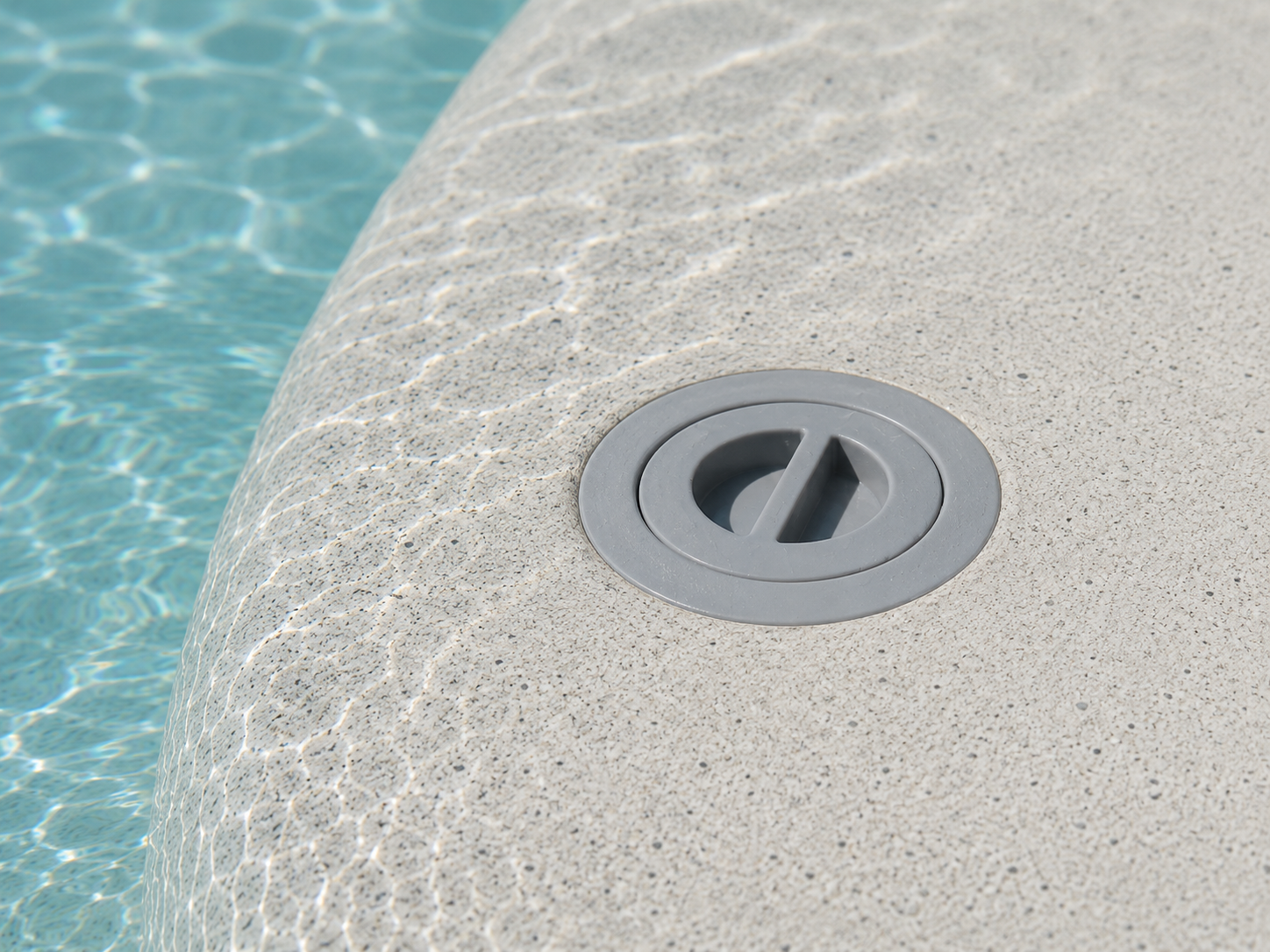 Existing builder-installed plastic pool umbrella sleeve in a Baja shelf